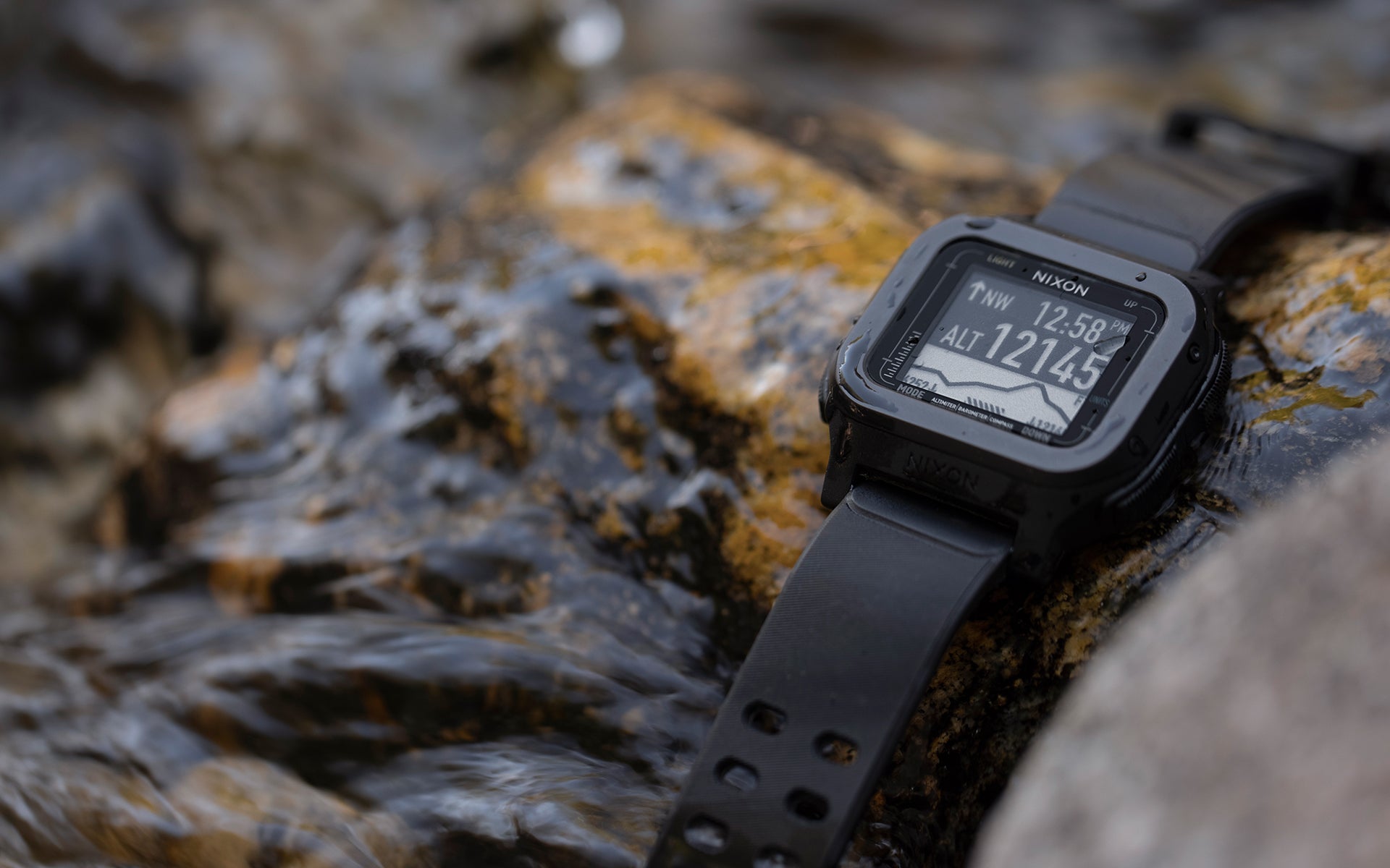 Nixon Regulus Expedition digital watch on a rock